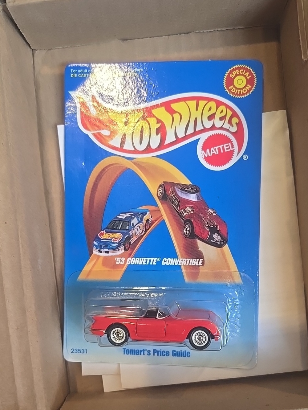HOT WHEELS 53 CORVETTE CONBERTIBLE TOMART'S PRICE GUIDE, CAST IRON, NEW
